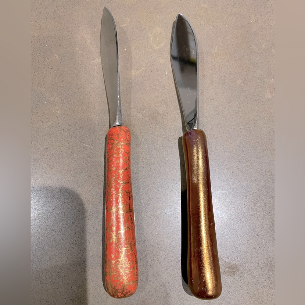 Set of two Michael Wainwright cheese knives
